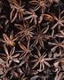 a bunch of star anise on a table