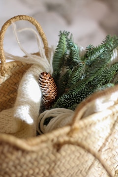 A cozy gift basket filled with local goodies in neutral colors