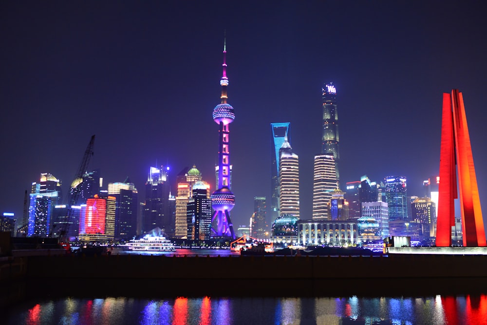 a view of a city at night from across the water