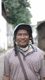 A middle-aged adult enjoying a healthy lifestyle outdoors.