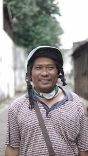 Happy middle-aged person enjoying an active lifestyle outdoors, symbolizing well-being.