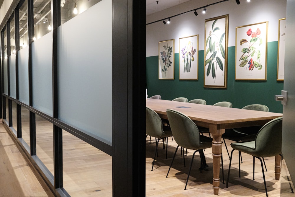 a conference room with a long table and chairs