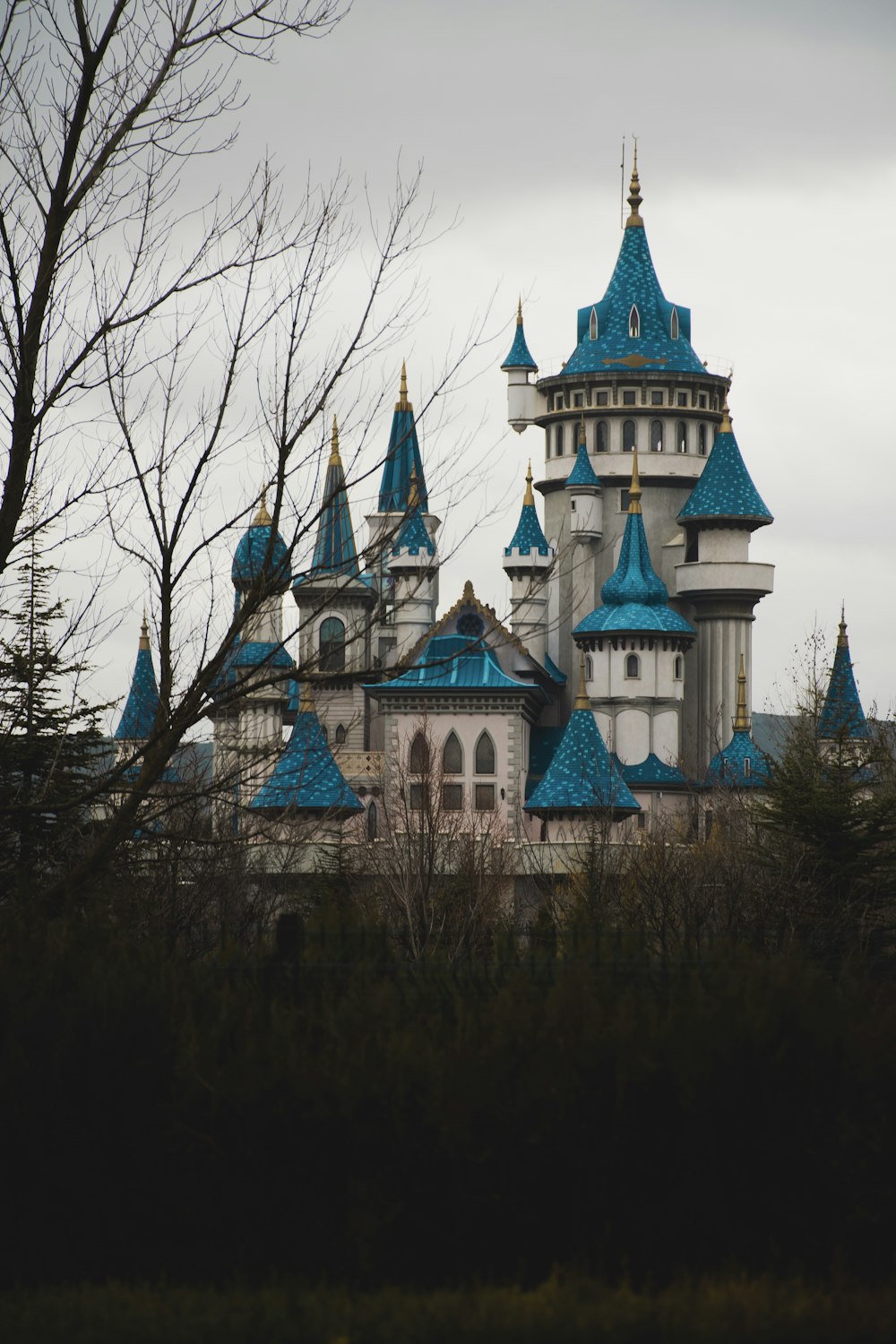 a large building with blue domes on top of it