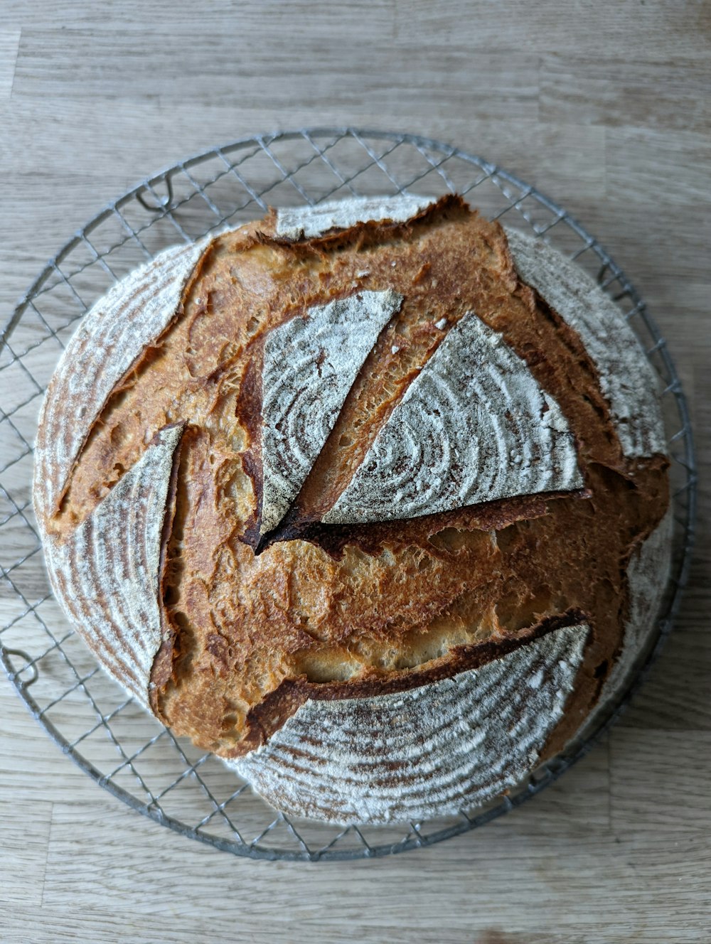 a loaf of bread sitting on top of a cooling rack