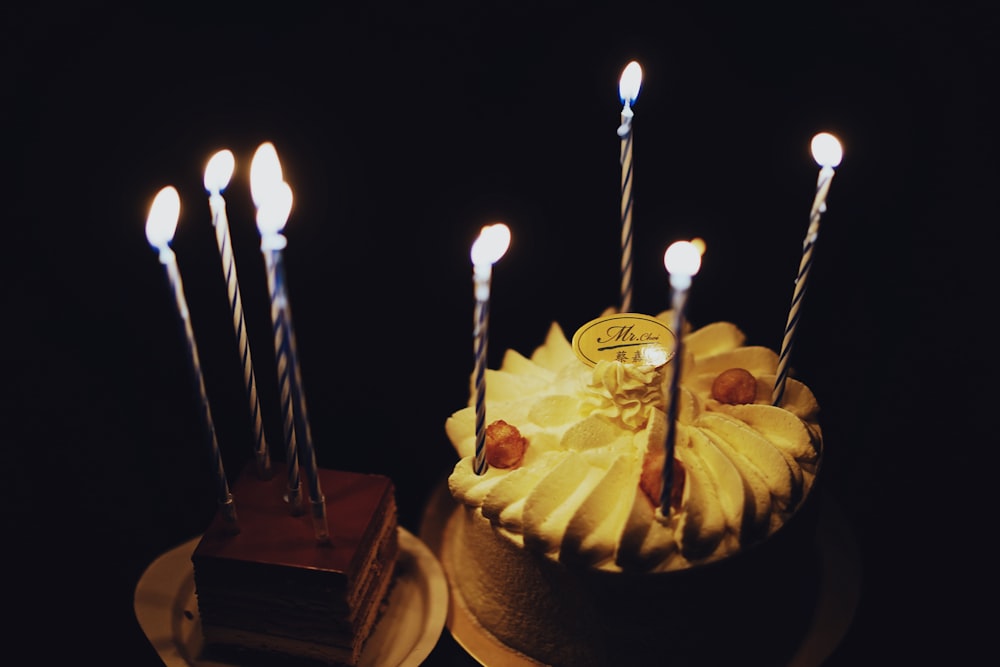 a couple of cakes sitting on top of a table