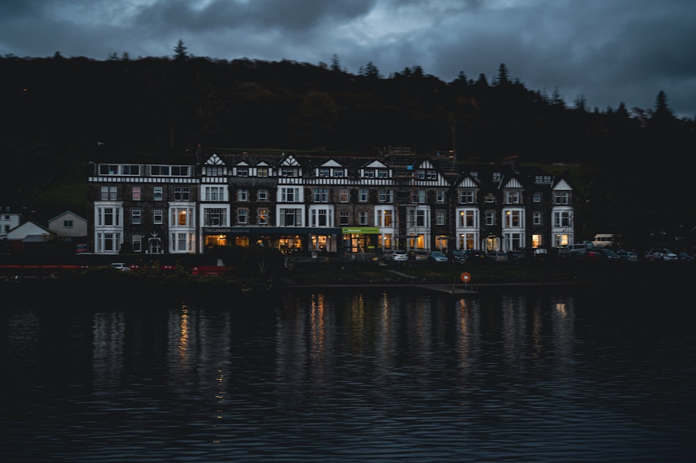 a large building sitting on top of a lake