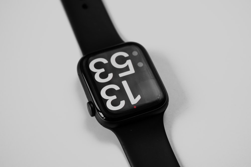 an apple watch with the time displayed on it