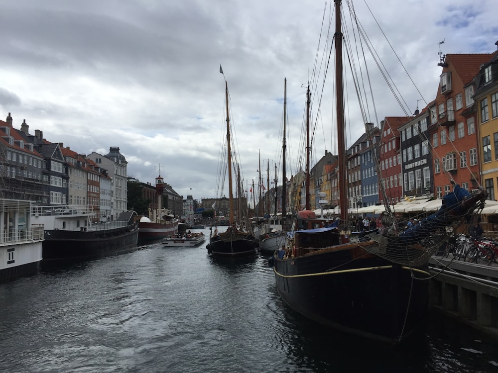 a group of boats that are sitting in the water