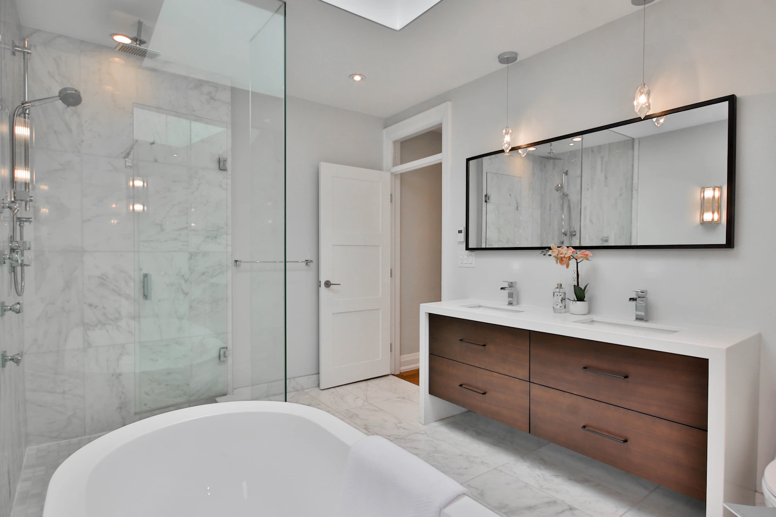 Luxury bathroom with bathtub and walk-in shower