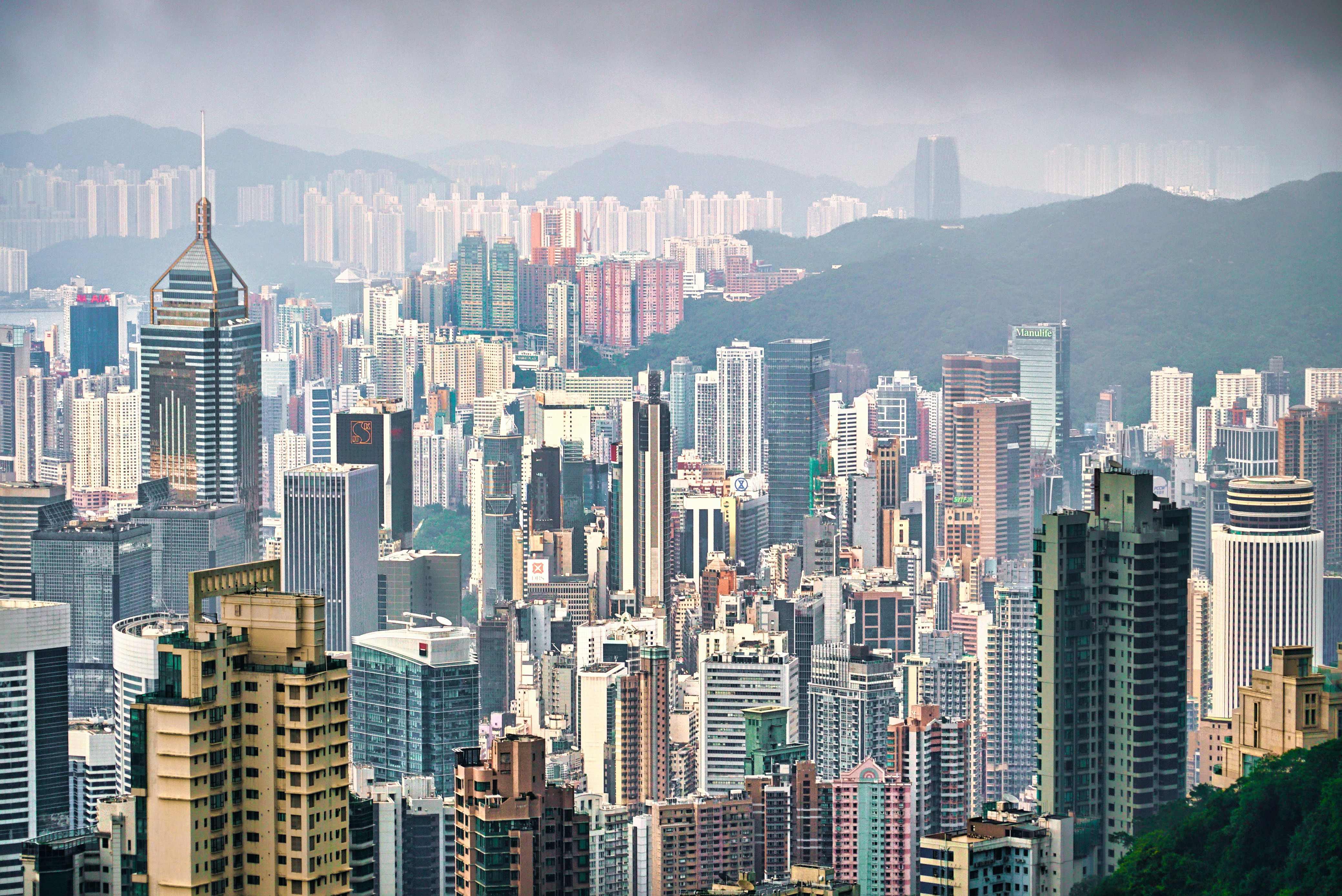 a view of a large city with tall buildings