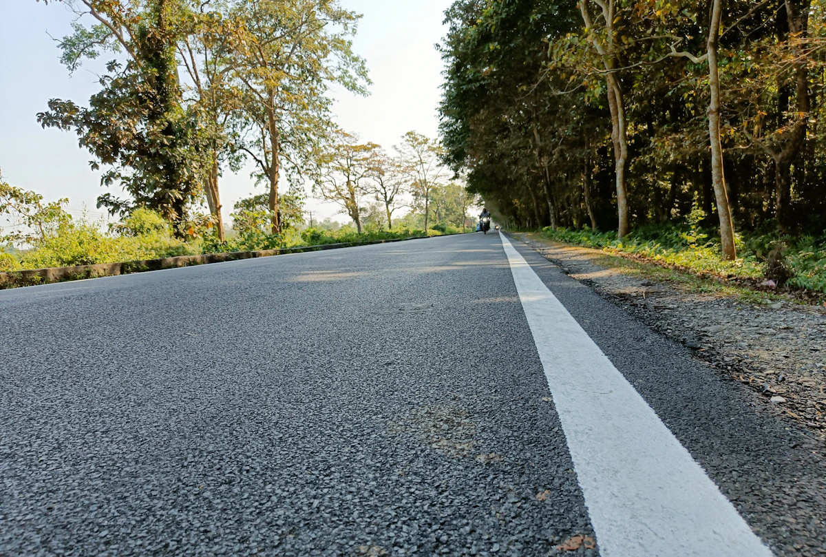 A road running through wooded hills