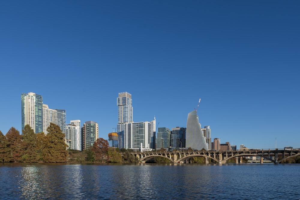 a large body of water surrounded by tall buildings