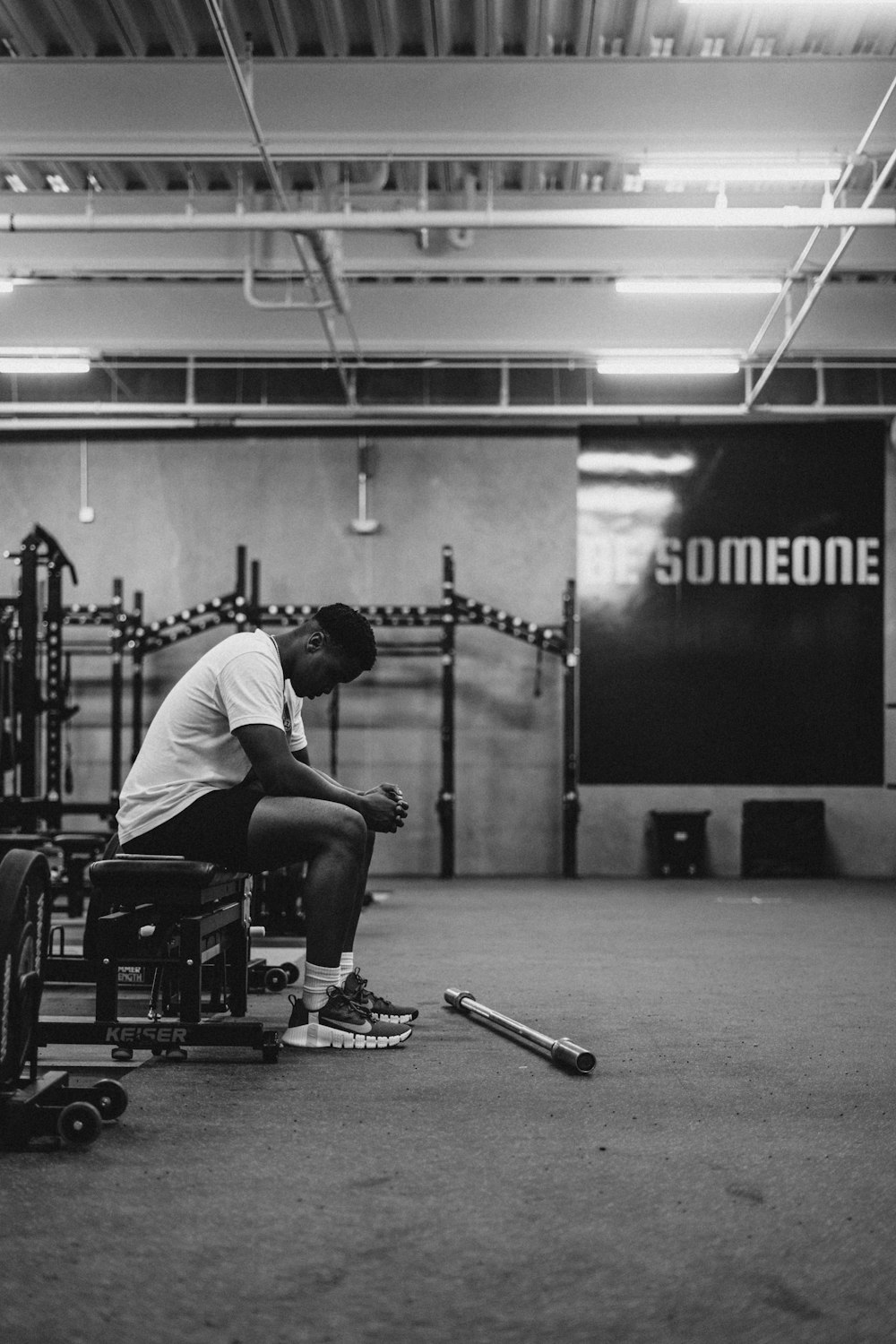 a man sitting in a wheelchair in a gym