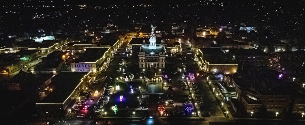 an aerial view of a city at night