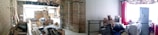 A partially renovated interior space with exposed bricks and beams. The area is cluttered with construction materials, cardboard boxes, and various tools. On the right, there is a small sitting area with a refrigerator, a stuffed animal, and other household items.