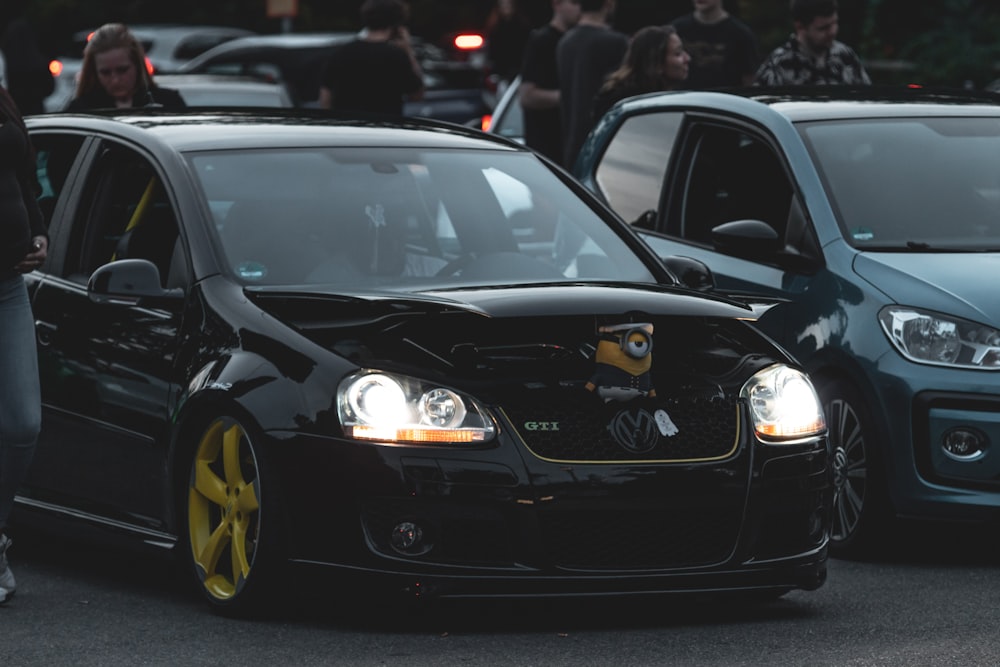 a couple of cars parked next to each other