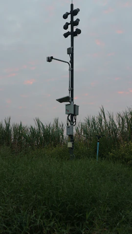 Surveillance camera overlooking a large agricultural field