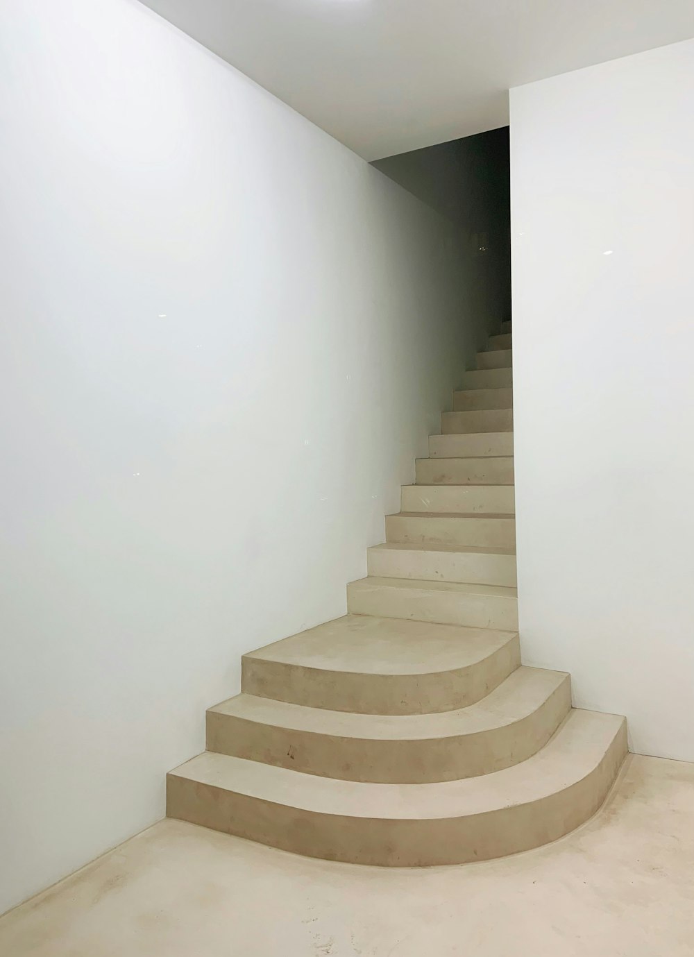 a set of stairs in a white room