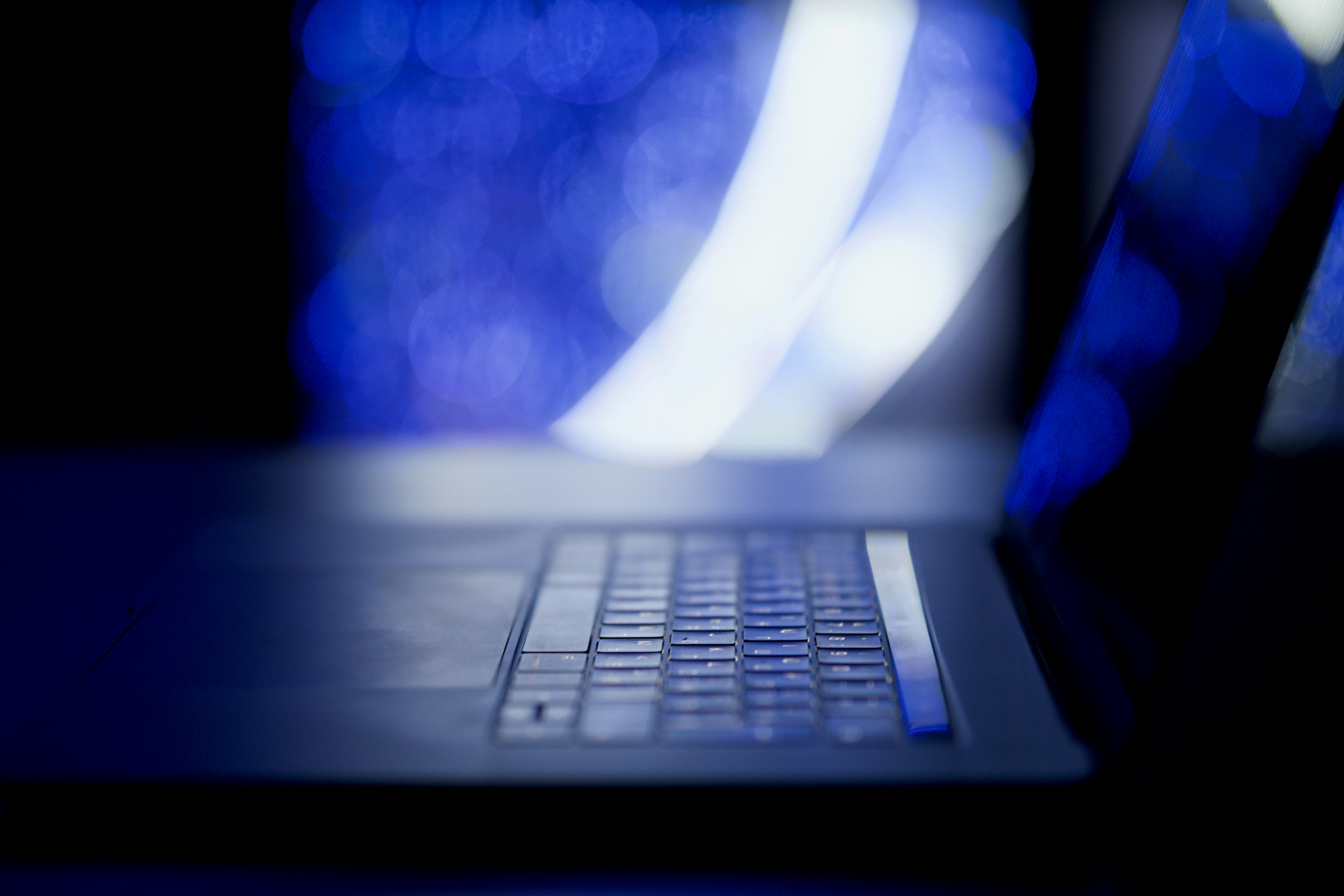 A laptop computer sitting on top of a table