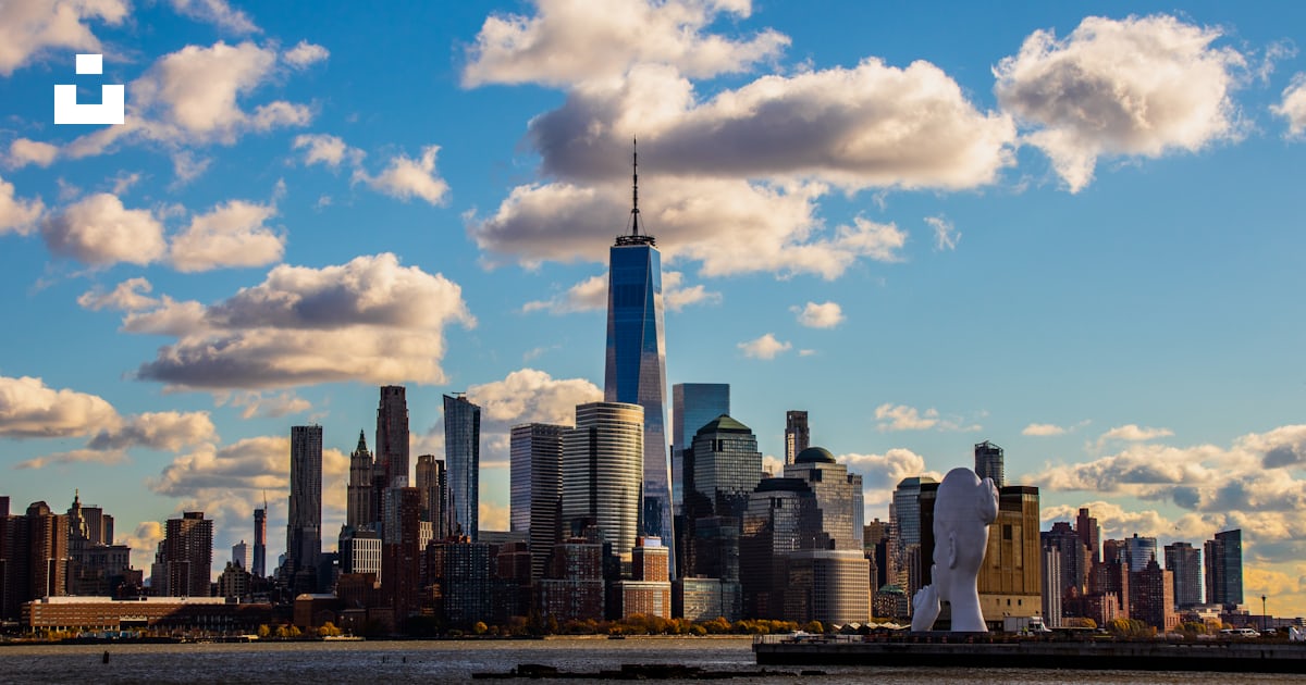 A view of a large city with a lot of tall buildings photo Free