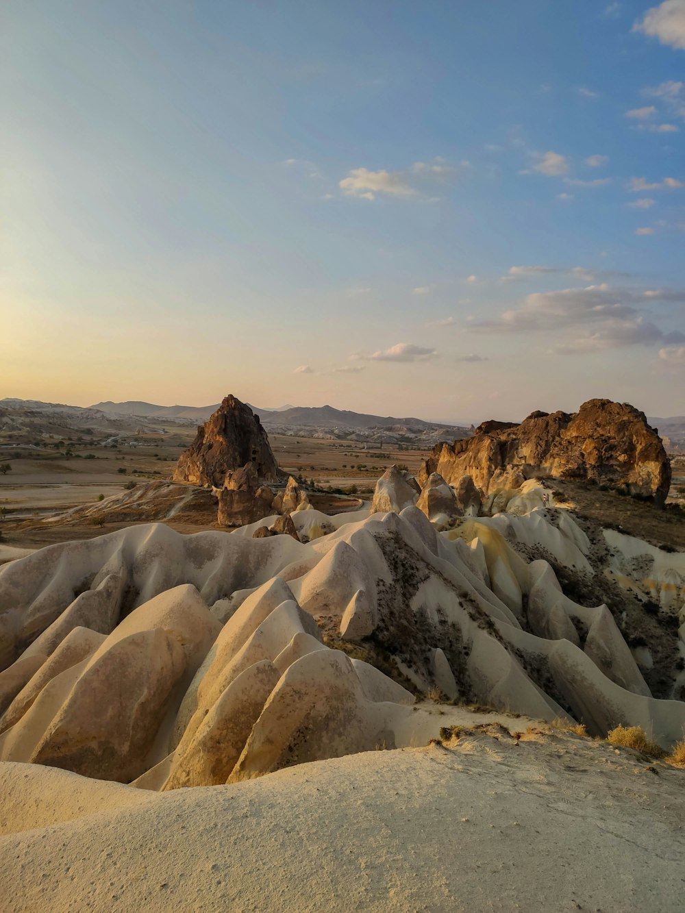 a desert landscape with rocks and sand