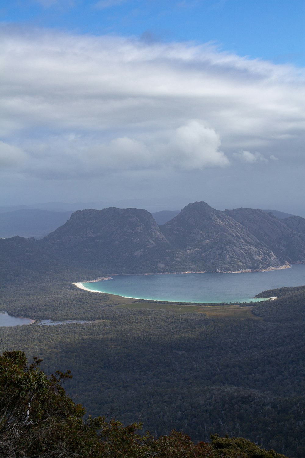 a large body of water surrounded by mountains