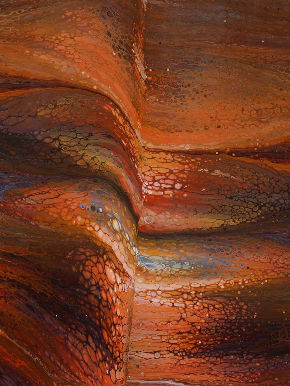 a close up of a painting of a wavy surface