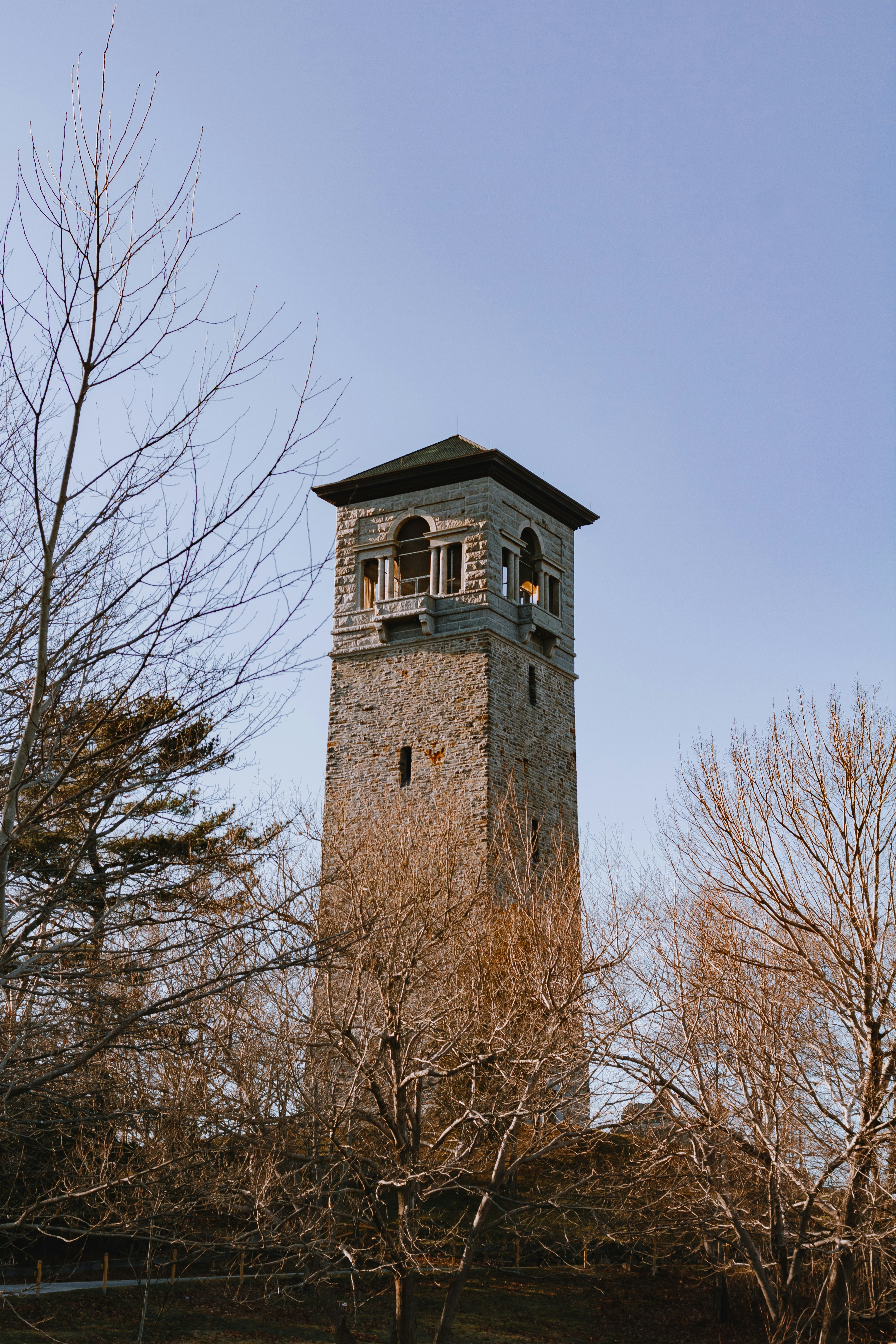 a tall tower with a clock on the top of it