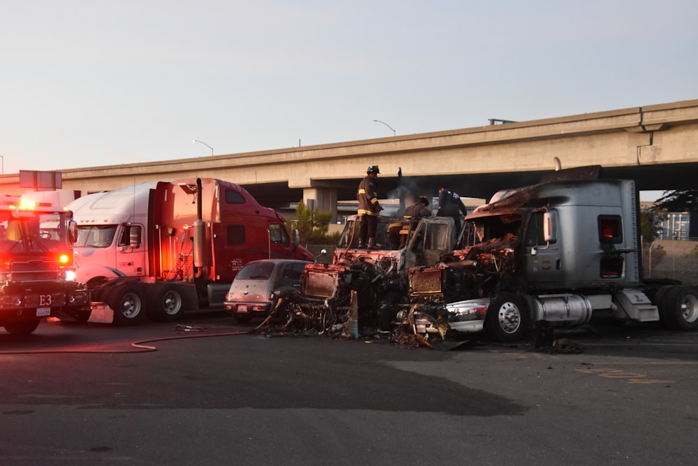 a bunch of trucks that are parked in a lot