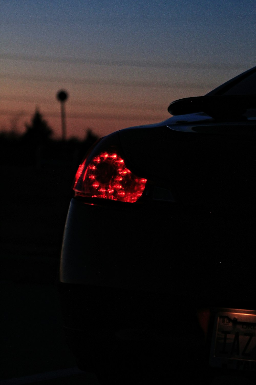the tail lights of a car at night