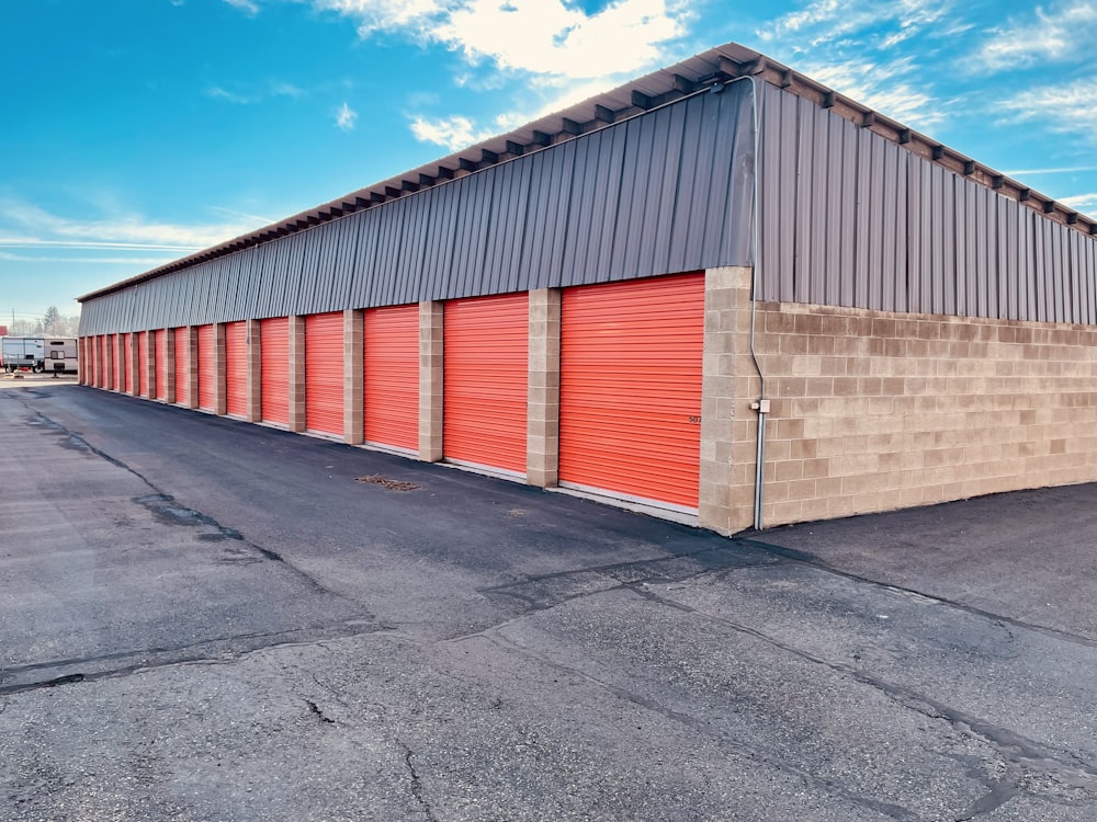 Storage containers. Modern clean lighted secure area with two neat rows of storage  containers photo – Garage door Image on Unsplash