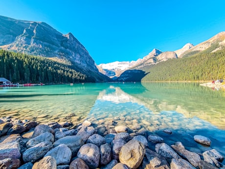 The Canadian Rockies - Lake Louise's turquoise water and boathouse