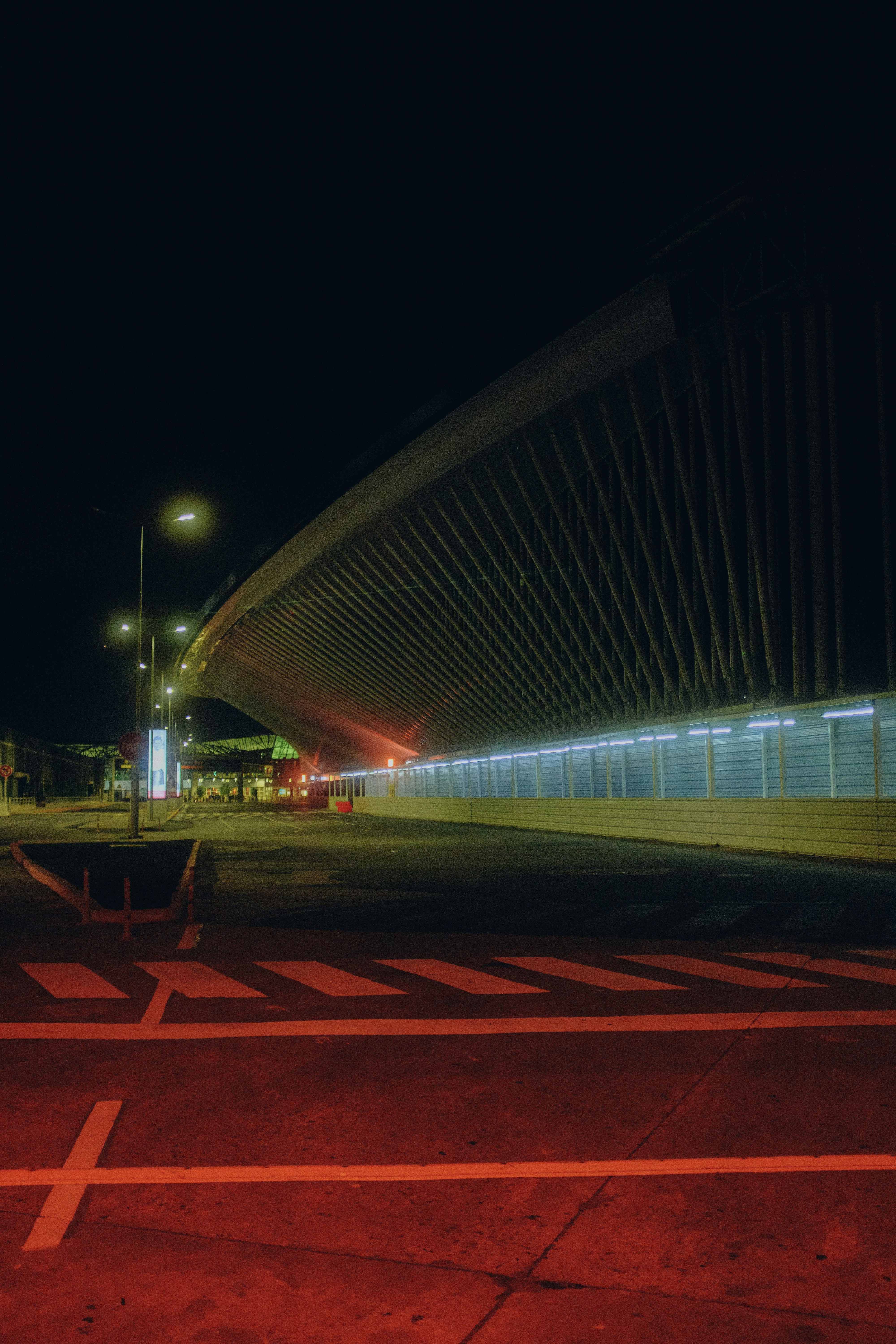 a long exposure photo of a bridge at night
