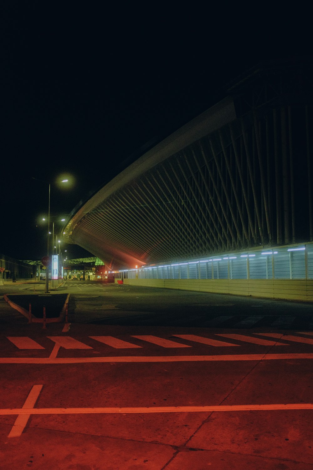 a long exposure photo of a bridge at night