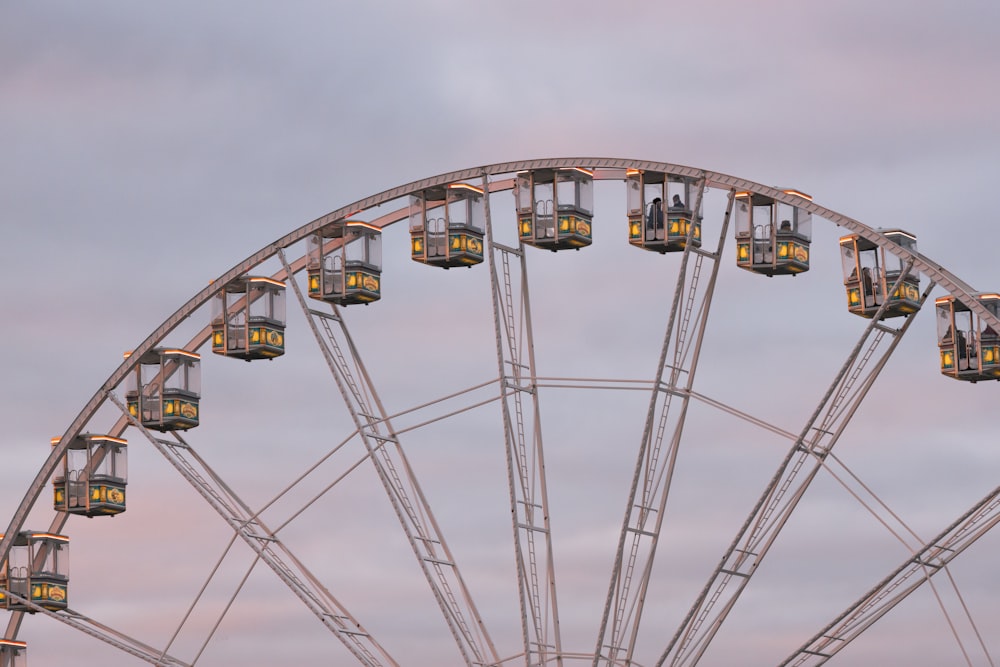 a ferris wheel with a sky background