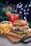 A juicy burger with a sesame seed bun, cheese, bacon strips, lettuce, and pomegranate seeds sits on a wooden board next to a serving of golden French fries in a white container. Behind the burger and fries is a tall glass of a red drink with ice and garnished with a strawberry and a sprig of mint. The background is decorated with bokeh lights creating a festive atmosphere.