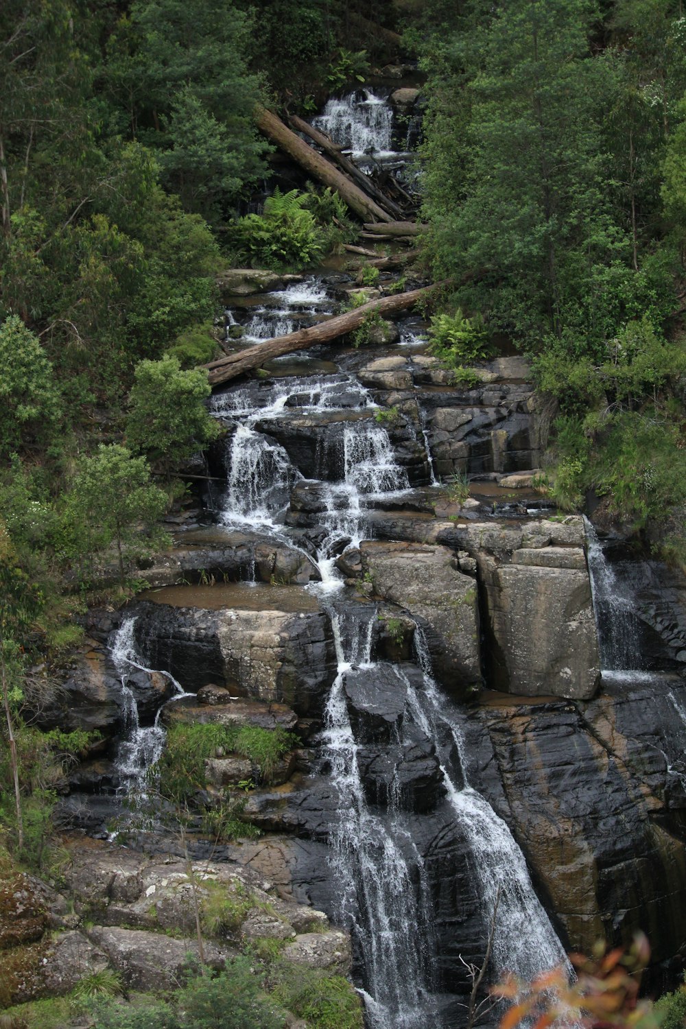 a large waterfall with lots of water coming out of it