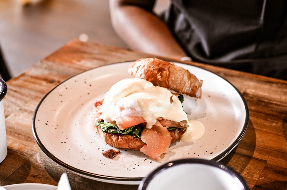 a plate of food on a wooden table