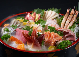 A beautifully arranged sashimi platter featuring fresh fish from Kyushu.