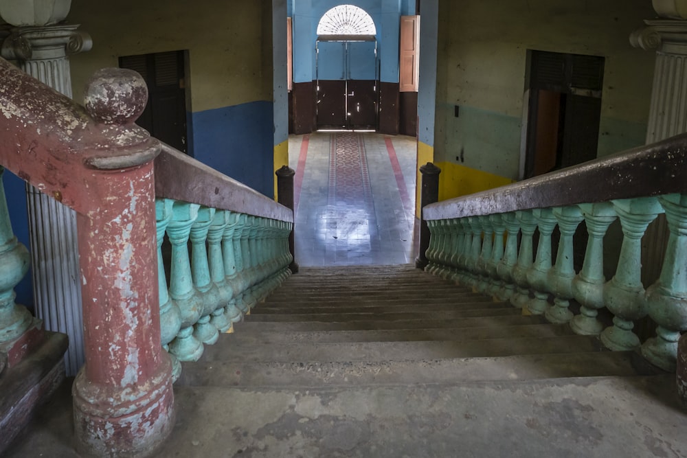 an old building with stairs and railings