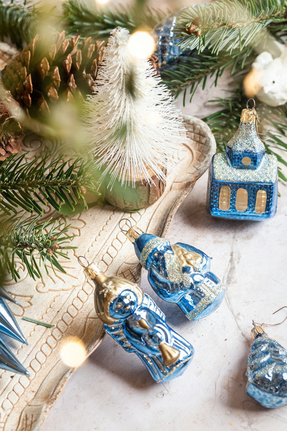 a close up of a christmas tree with ornaments