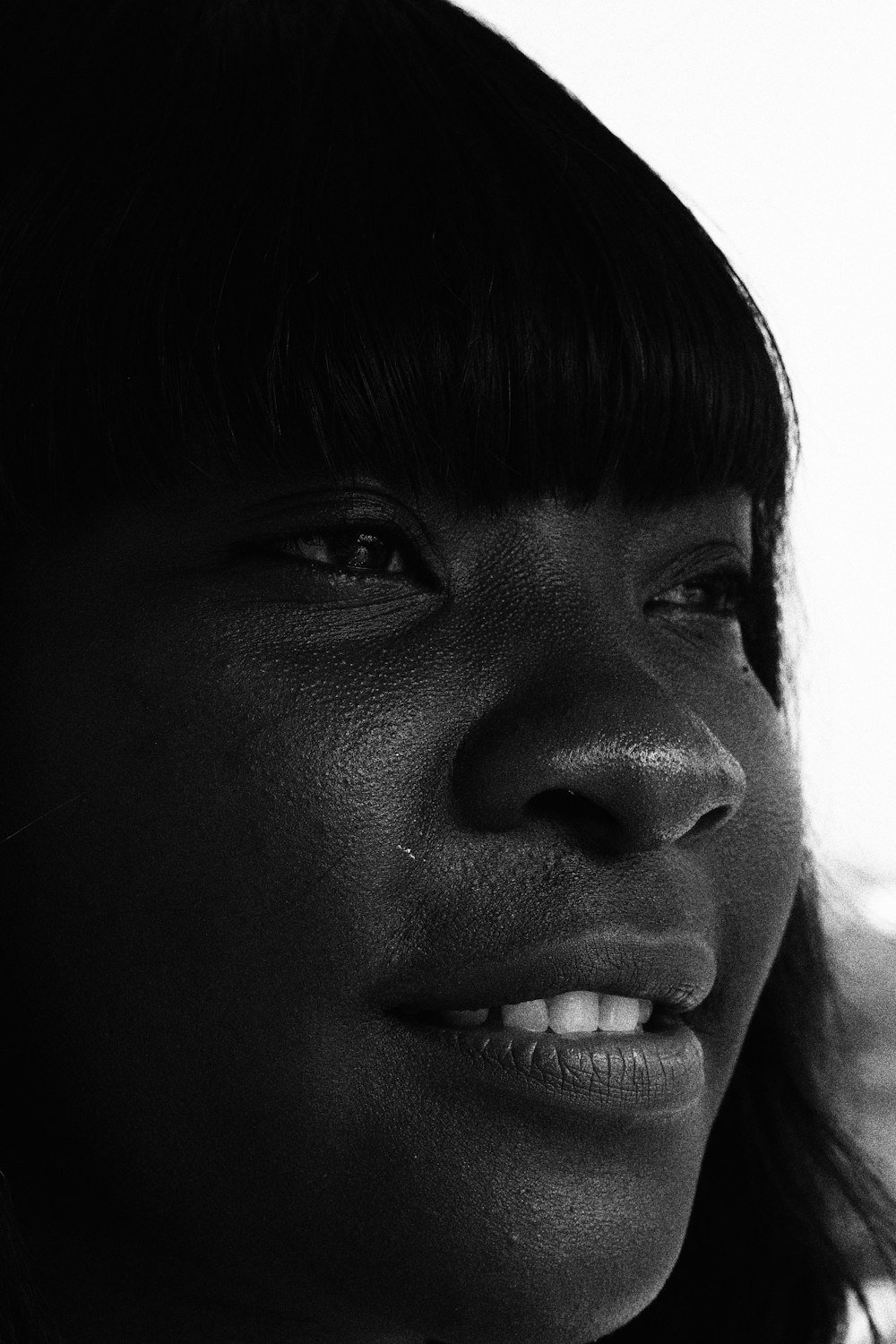 a black and white photo of a woman's face