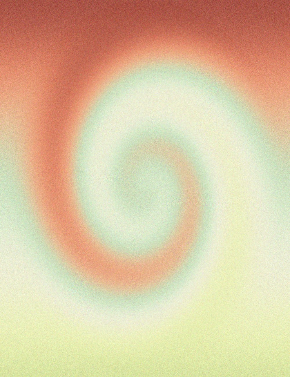 a blurry image of a red and green swirl