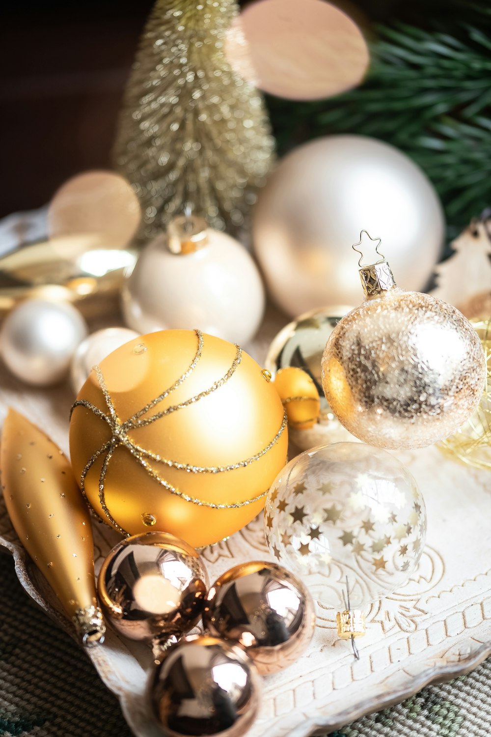 a close up of a tray with ornaments on it