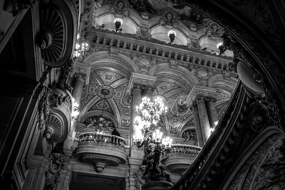 a black and white photo of a chandelier