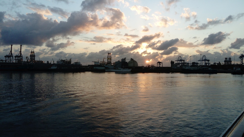 A scenic view of the Batam shipyard at sunset.