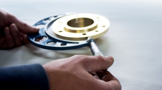 a person is working on a metal object