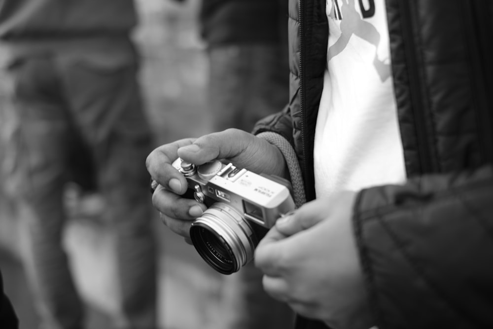 a man holding a camera