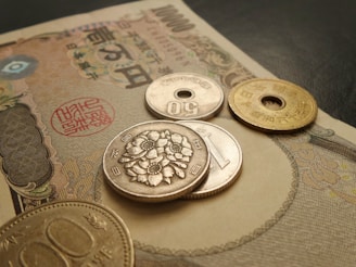 a bunch of coins sitting on top of a table