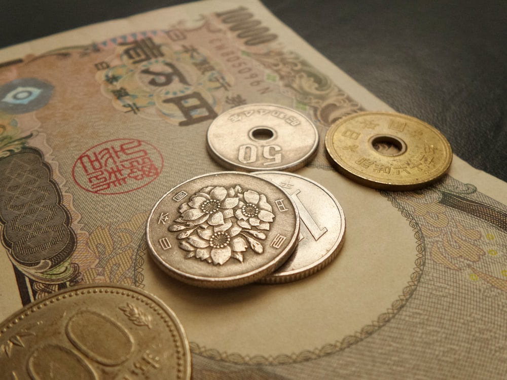 a bunch of coins sitting on top of a table